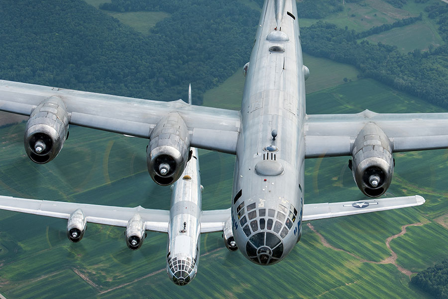 B-29 Doc and B-29 Fifi Flying over fields