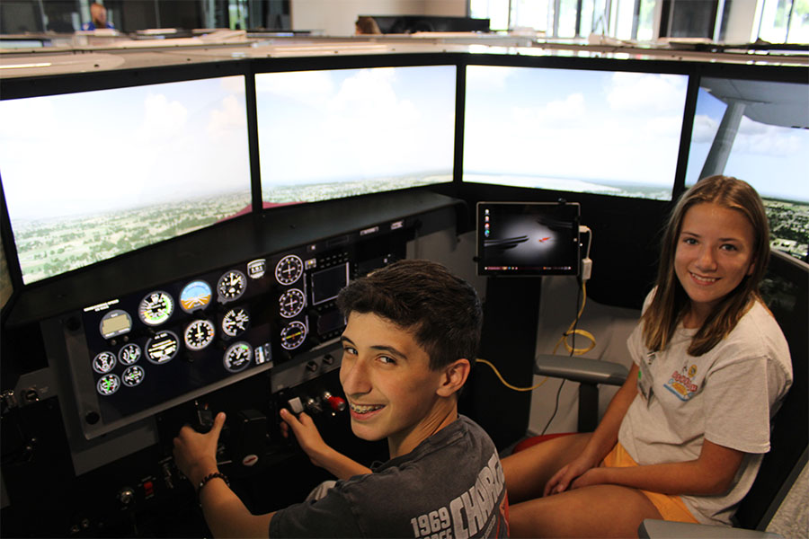 eaa air academy students flying in simulator